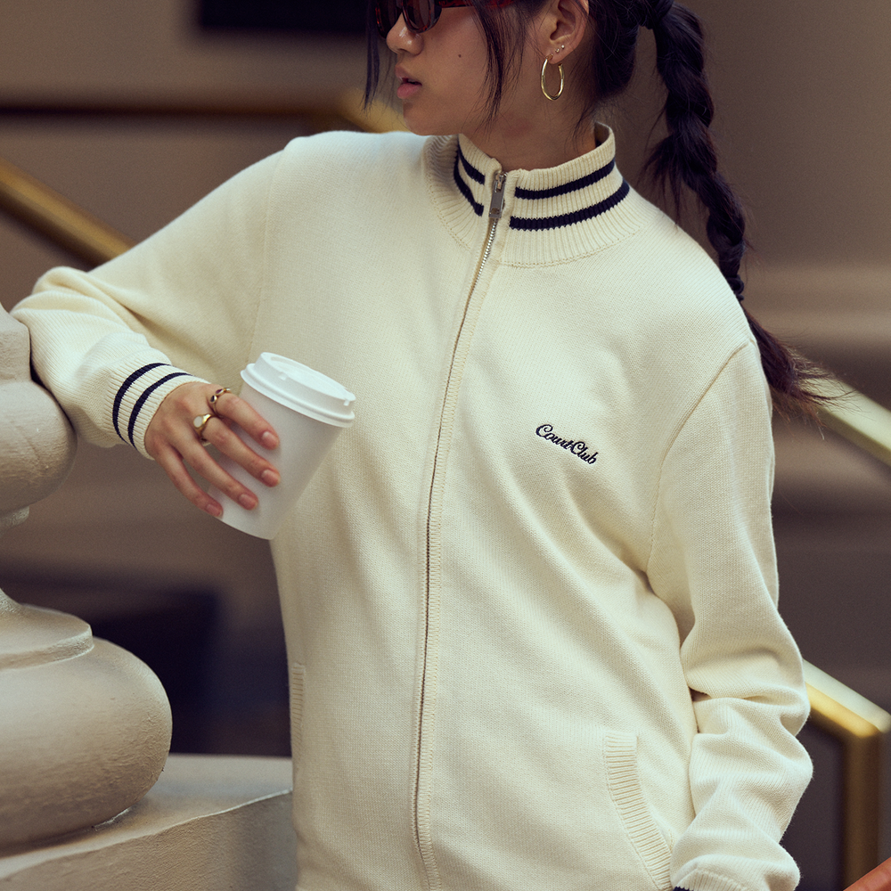 
                      
                        Turtleneck Zip-Up with embroidery
                      
                    